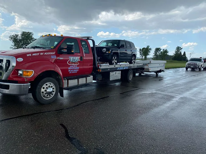flat bed car towing